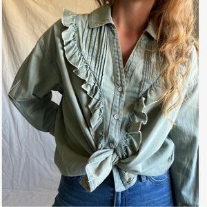 Free People new with tags never been worn denim button up blouse